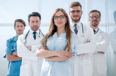 Group of doctors and nurses standing in the hospital roomthe concept of health